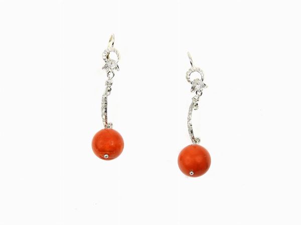 White gold ear pendants with diamonds and red coral