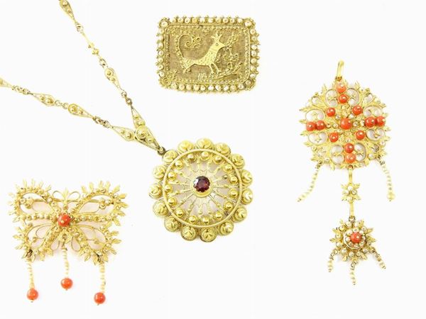 Three yellow gold brooches and a necklace with pendant set with corals, seed pearls and garnet