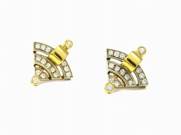 White and yellow gold earrings with diamonds