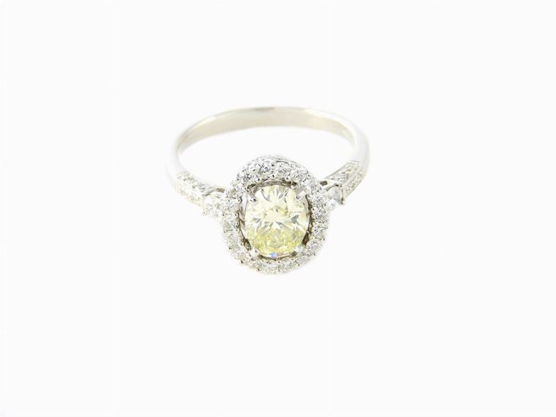 Anello Solitario in Oro Bianco e Diamanti
