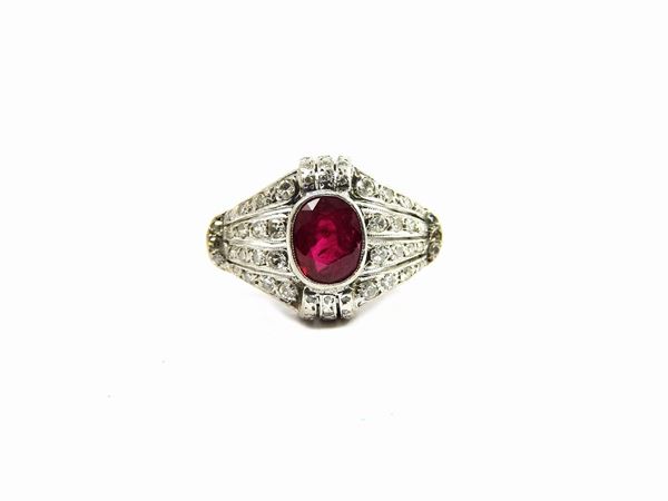Platinum ring with diamonds and ruby