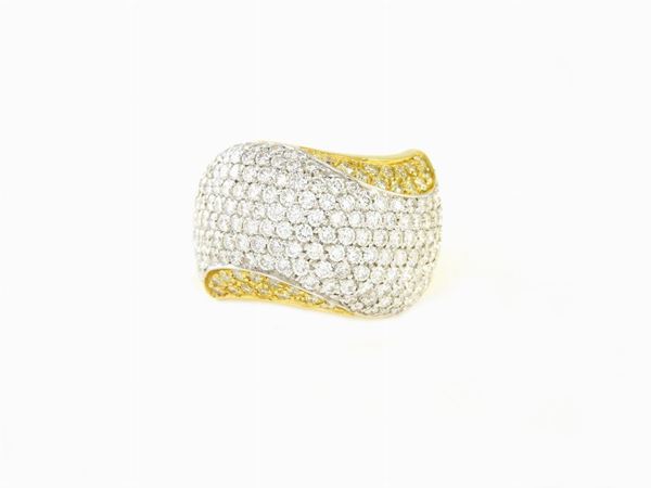 Yellow gold domed ring with colourless and yellow diamonds
