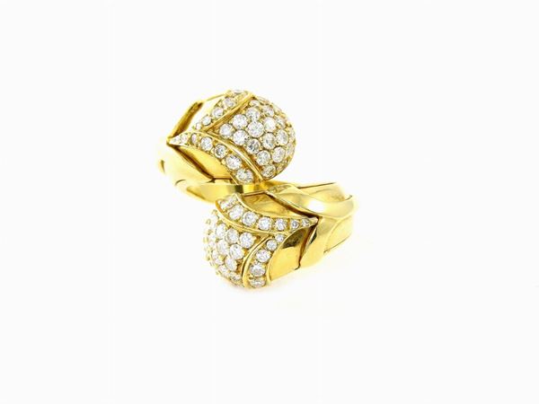 Yellow gold croisè ring with diamonds