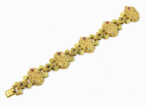 Pink and yellow gold bracelet set with diamonds, rubies and sapphires