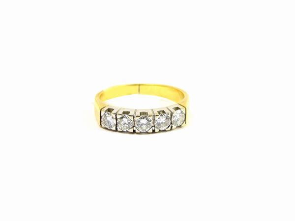 White and yellow gold eternity ring with diamonds