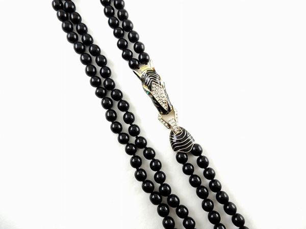Les Bernard NYC Black glass, goldtone metal, enamel and rhinestones necklace