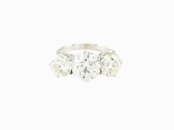 White gold trilogy ring with diamonds