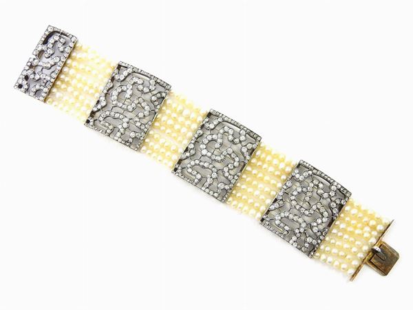 Yellow gold and silver bracelet with diamonds and pearls