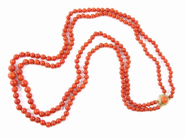 Two graduated strands red coral necklace with yellow gold and coral clasp