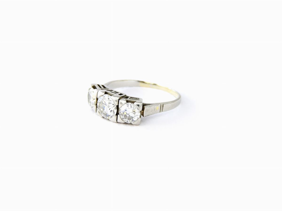 Anello Trilogy in Platino e Diamanti