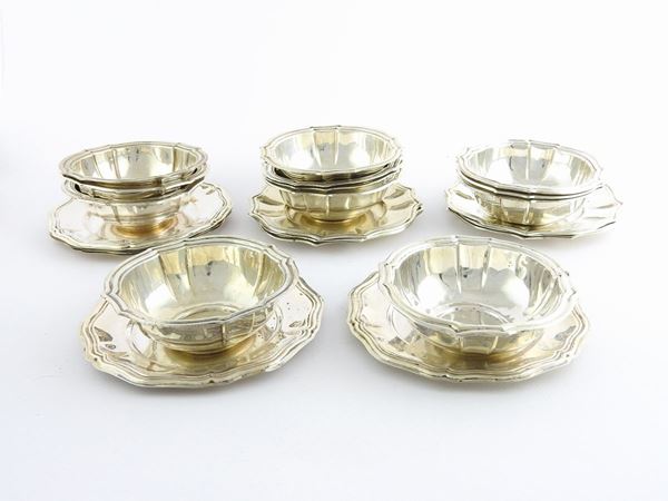 A Set of Twelve Silver Bowls
