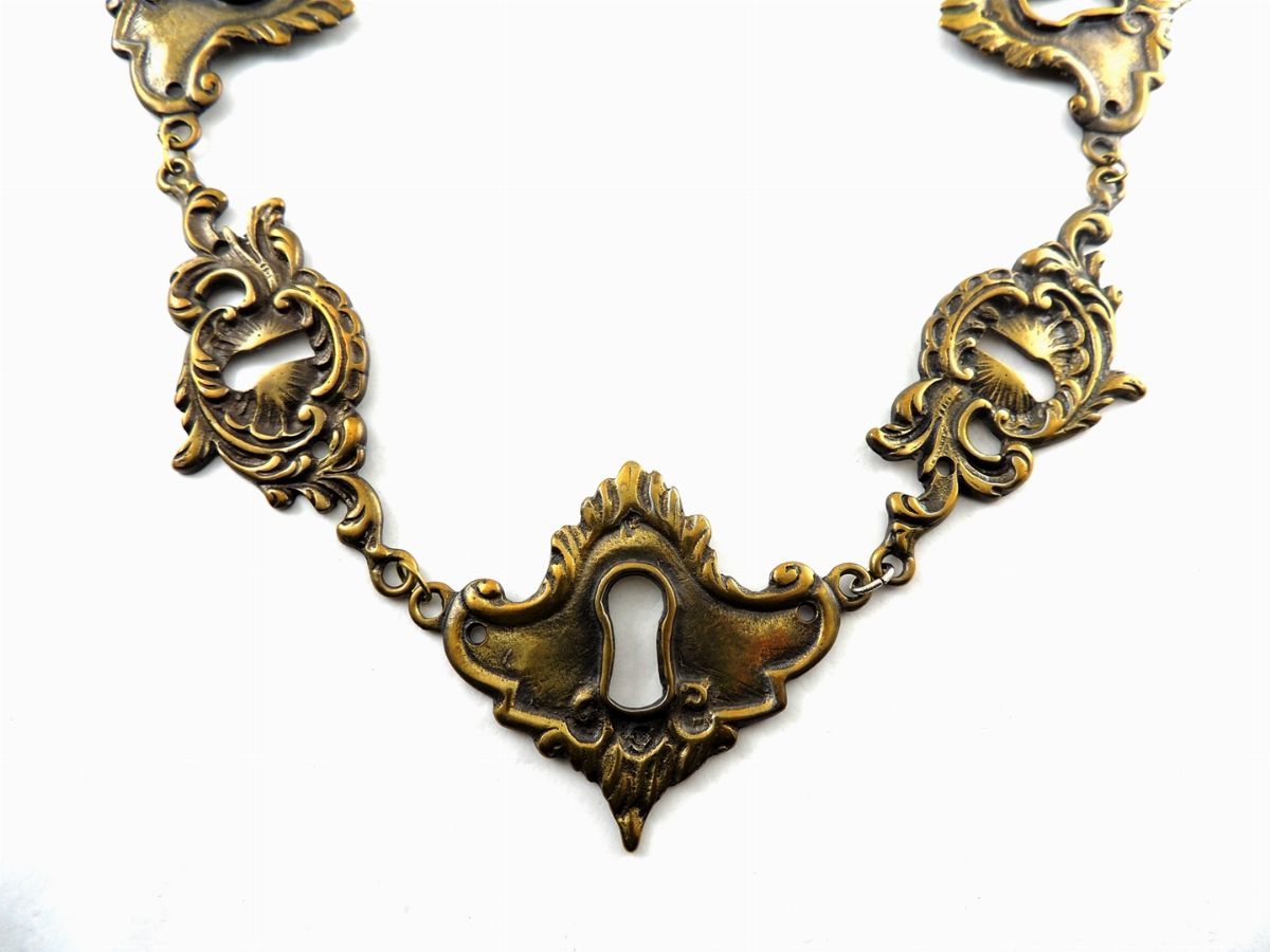 Collana Moschino in Metallo Brunito
