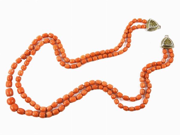 Graduated orange coral necklace with silver clasp set with semiprecious stones