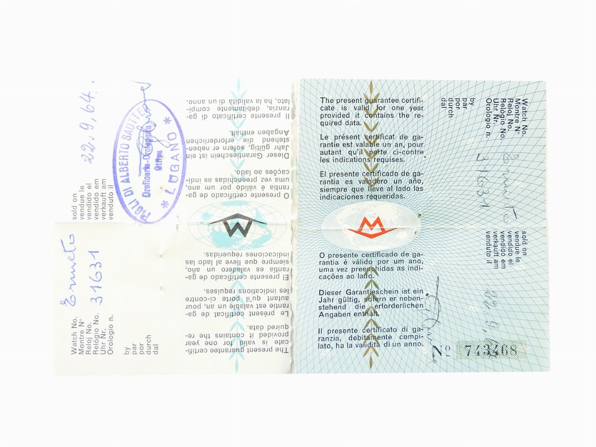 Orologio da Viaggio in Acciaio Dorato e Pelle
