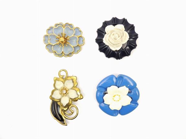 Four enameled metal and celluloid bijoux brooches