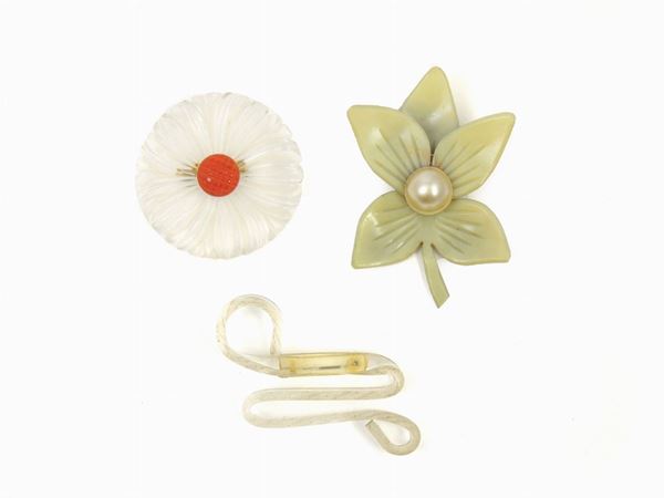 Three lucite and celluloid bijoux brooches