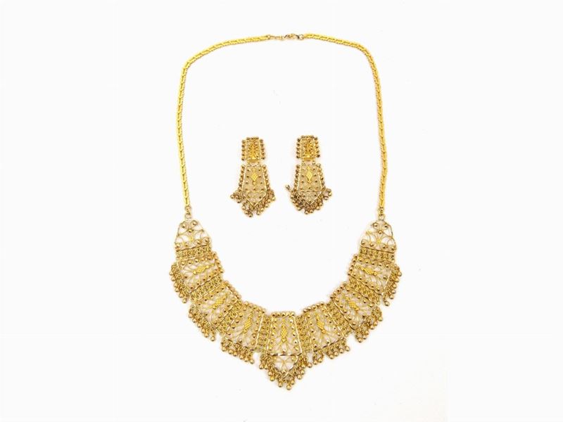 Parure in Metallo Dorato e Strass