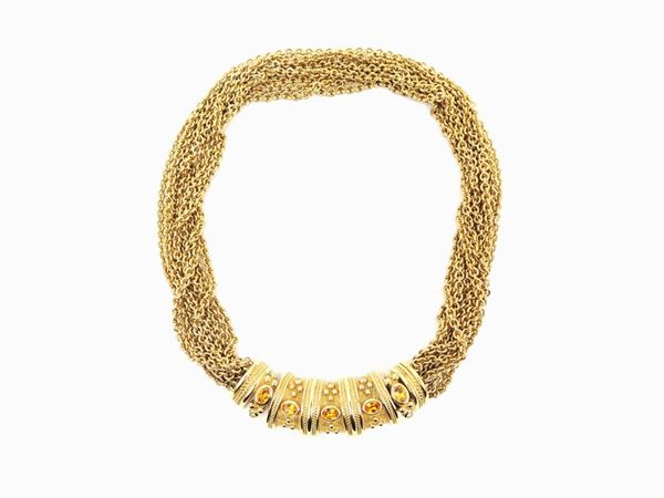 Grosse Goldtone metal and rhinestones necklace