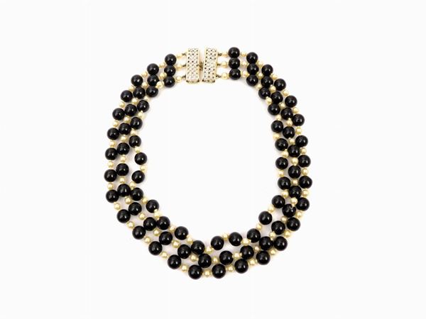 Black glass pearls, rhinestones and faux pearls