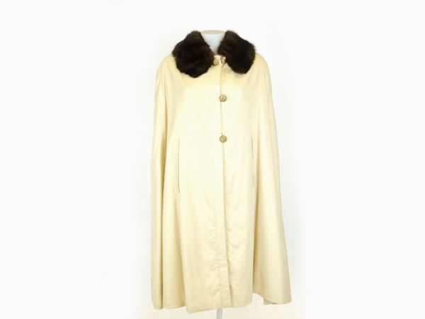 Yellow cashmere cape with mink fur border