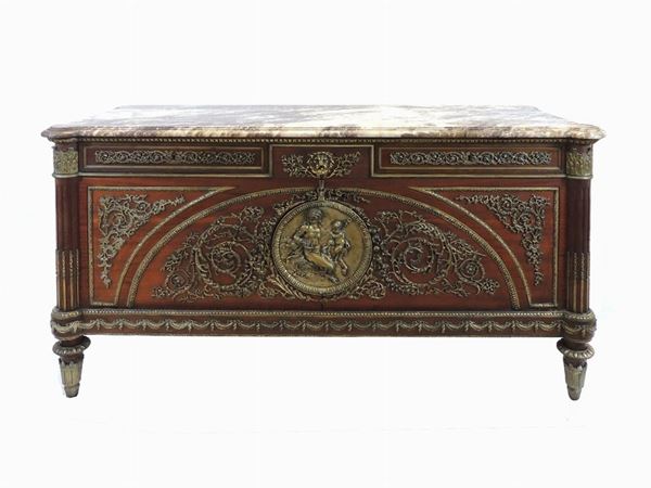 A Louis XVI Style Gilt Bronze Mounted Mahogany Commode à Vantaux after the Model by Benneman