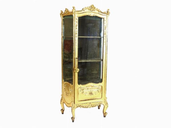 A Rococo Style Giltwood Cabinet