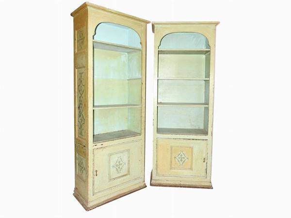 A Pair of Lacquered and Painted Wooden Bookcases