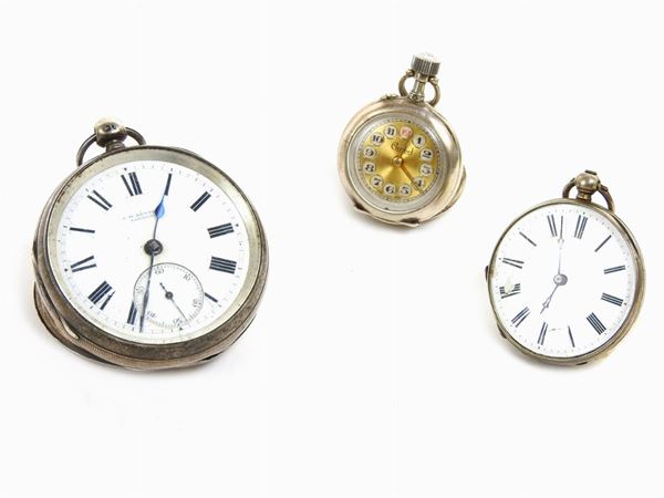 Tre orologi da tasca in argento