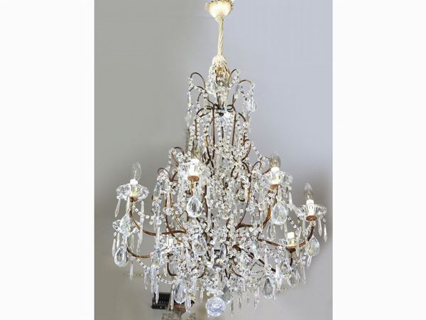 A Gilded Metal and Glass Chandelier