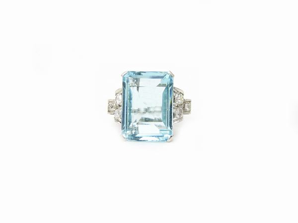 Platinum ring with diamonds and aquamarine