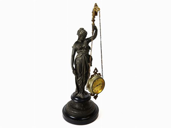 A Gilded and Patinated Metal Table Clock  (Florence, Cesare Barbani e Figlio)  - Auction Furniture and Paintings from a house in Val d'Elsa - Lots 1-303 - I - Maison Bibelot - Casa d'Aste Firenze - Milano