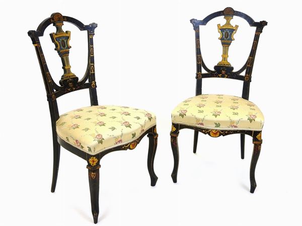 A Set of Four Lacquered and Painted Wood Chairs