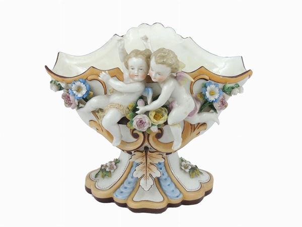 A German Painted Porcelain Figural Vase