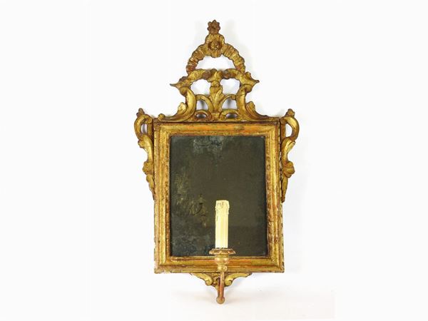 A Giltwood Mirror with Wall Lamp