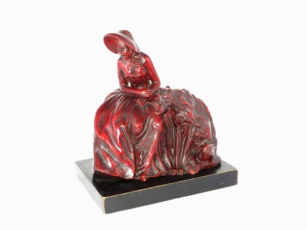 A Red Patinated Earthenware Figure of a Lady With Dog