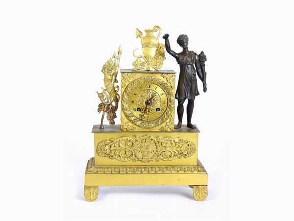 A Gilded and Patinated Bronze Pendulum Mantel Clock