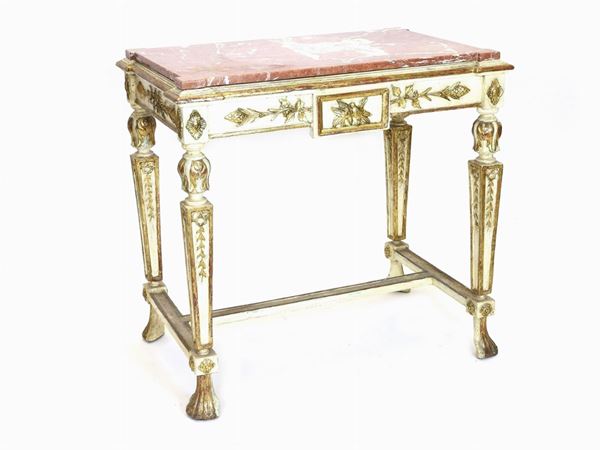 Tavolino console in legno laccato avorio e in parte dorato