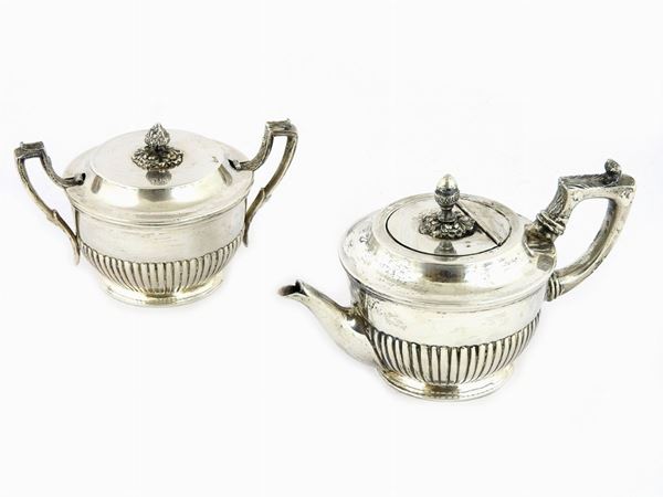 A Silver Teapot and a Sugar Bowl