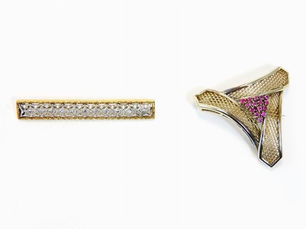 Two yellow and white gold brooches with diamonds and rubies