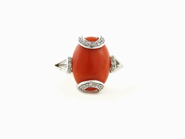 White gold ring with red coral and diamonds