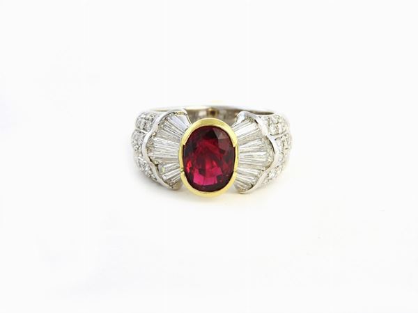 White and yellow gold ring with diamonds and ruby