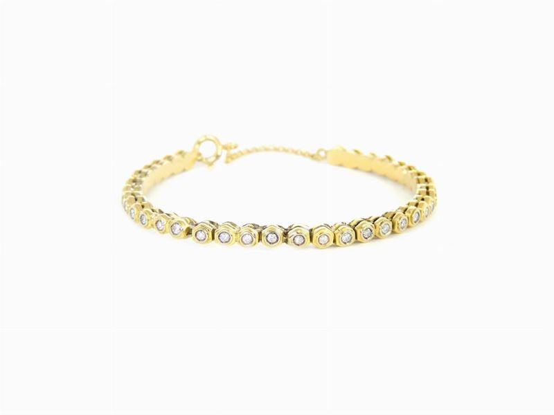 Bracciale Rigido in Oro Giallo e Diamanti