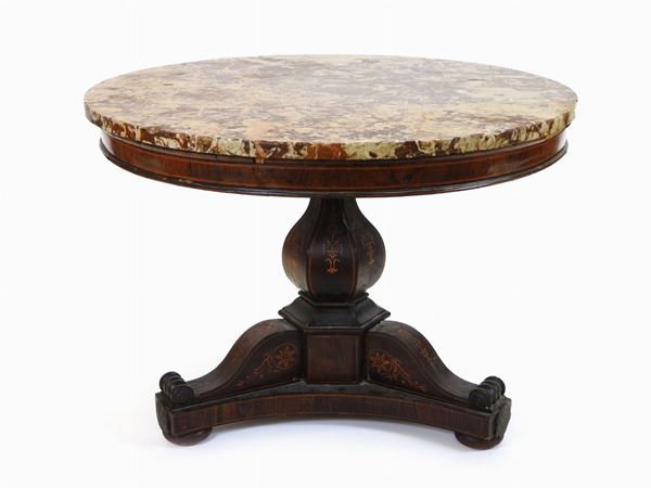 A Round Rosewood Table