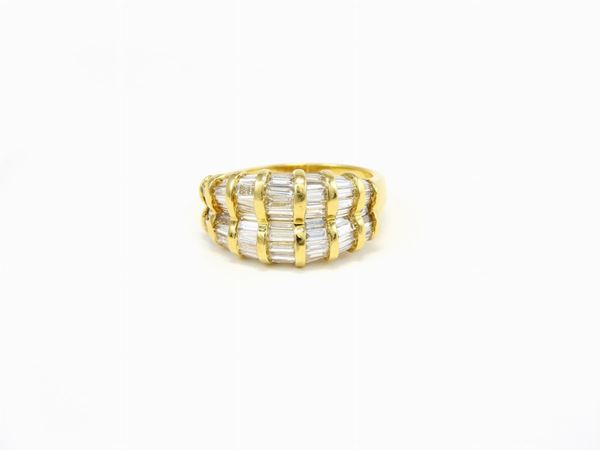 Yellow gold double band ring with diamonds