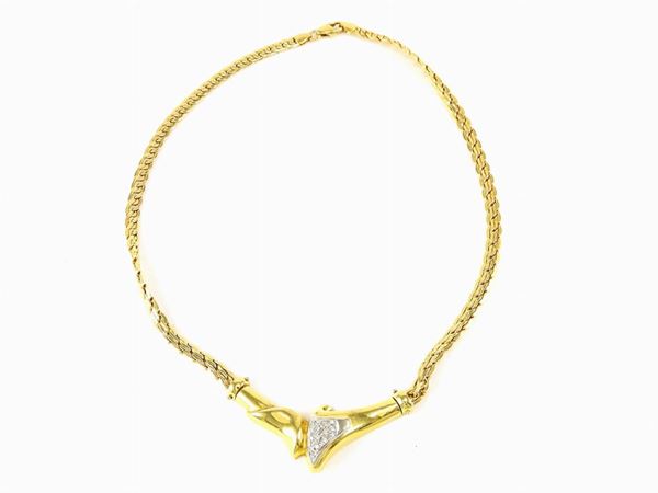 White and yellow gold necklace with diamonds