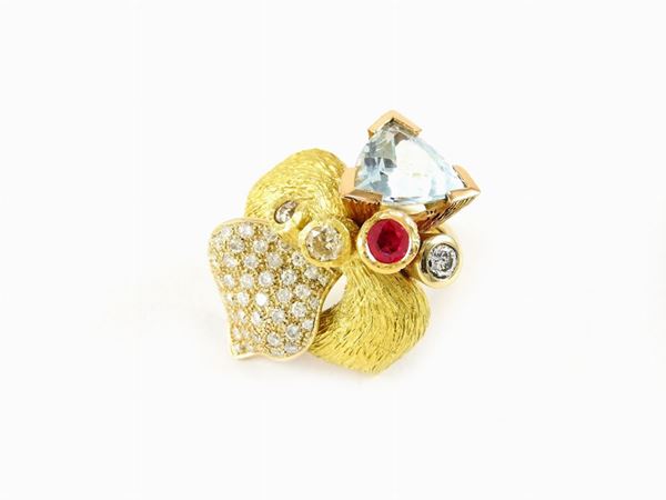 Satin yellow gold ring with diamonds, aquamarine and ruby