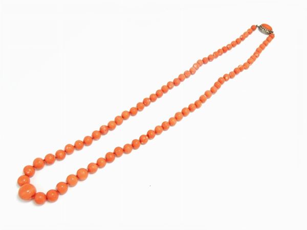 Japanese graduated orangish-red coral necklace with white gold clasp set with diamonds and coral