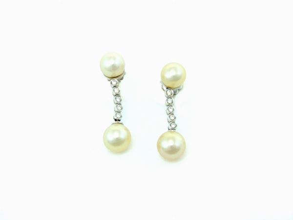 White gold ear pendants with cultured Akoya pearls and diamonds
