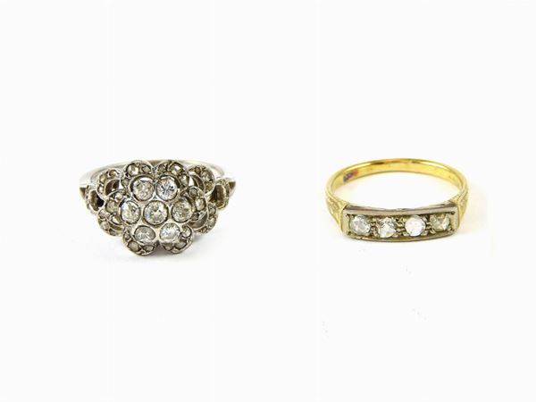 Two yellow and white gold rings with diamonds