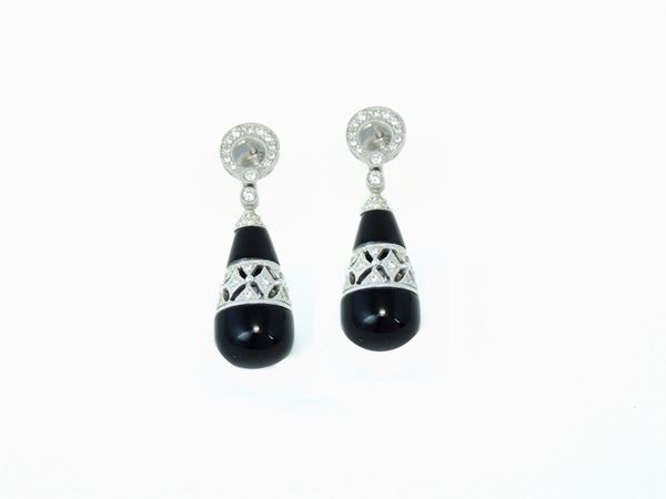 White gold ear pendants with diamonds and onyx
